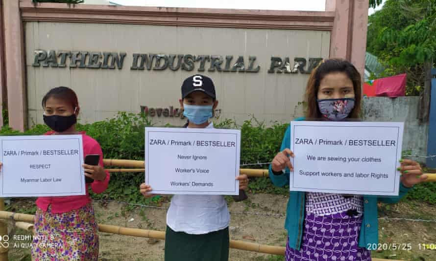 Workers outside Huabo Times factory in Pathein, Myanmar, send messages to brands.