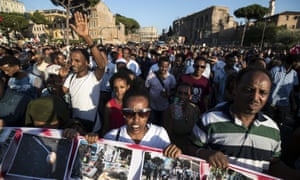 People take to the streets in support of refugees during a rally staged by the ‘Movements for Home’ in Rome last month.