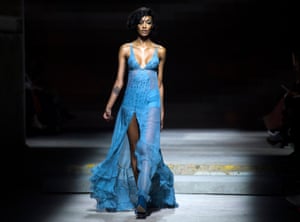 British model Jourdan Dunn presents a creation by Topshop