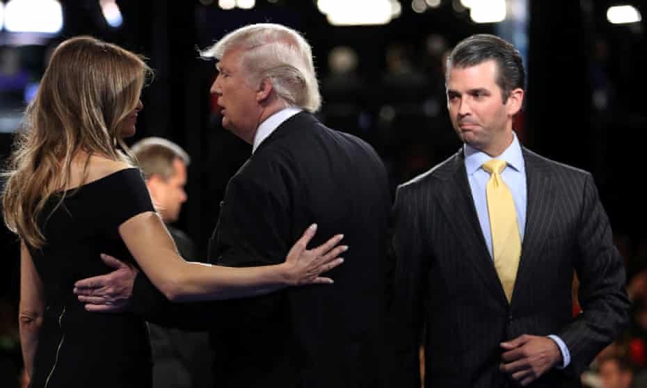 Donald Trump Jr watches his father hug wife Melania after a presidential debate at Hofstra University in Hempstead, New York last September.