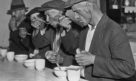 Unemployed men eat soup in Washington, circa 1935. 