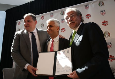 Sunil Gulati, (center) president of the United States Soccer Federation (USSF), Canadian CONCACAF President Victor Montagliani (left) and Mexican Football Federation President Decio De Maria hold up a signed unified bid for the 2026 soccer world cup on April 10, 2017 in New York City. Canada, the United States and Mexico launched their bid to co-host the 2026 World Cup at a news conference atop the Freedom Tower in lower Manhattan. The leaders of the three country's soccer federations are seeking to host the first World Cup with an expanded 48-nation field. (Photo by Spencer Platt/Getty Images)