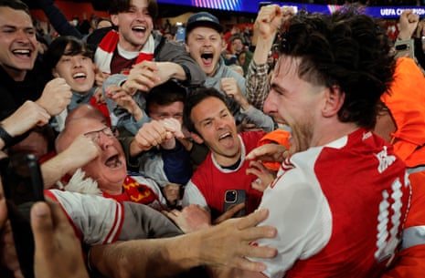 Declan Rice is mobbed by ecstatic Arsenal fans after his side's midweek Champions League semi-final victory over Atlético Madrid.