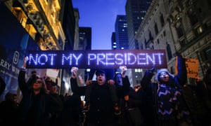 Demonstrators protest against then president-elect Donald Trump in front of Trump Tower in New York City, on 12 November 2016.