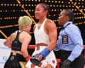 Alycia Baumgardner walks to the corner during her unified junior lightweight title fight with Bo Mi Re Shin early Saturday morning in New York.