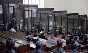 The courtroom and soundproof dock at the Rabaa mass trial.