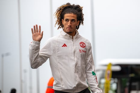 Manchester United’s Hannibal Mejbri waves to fans upon his arrival at Old Trafford.