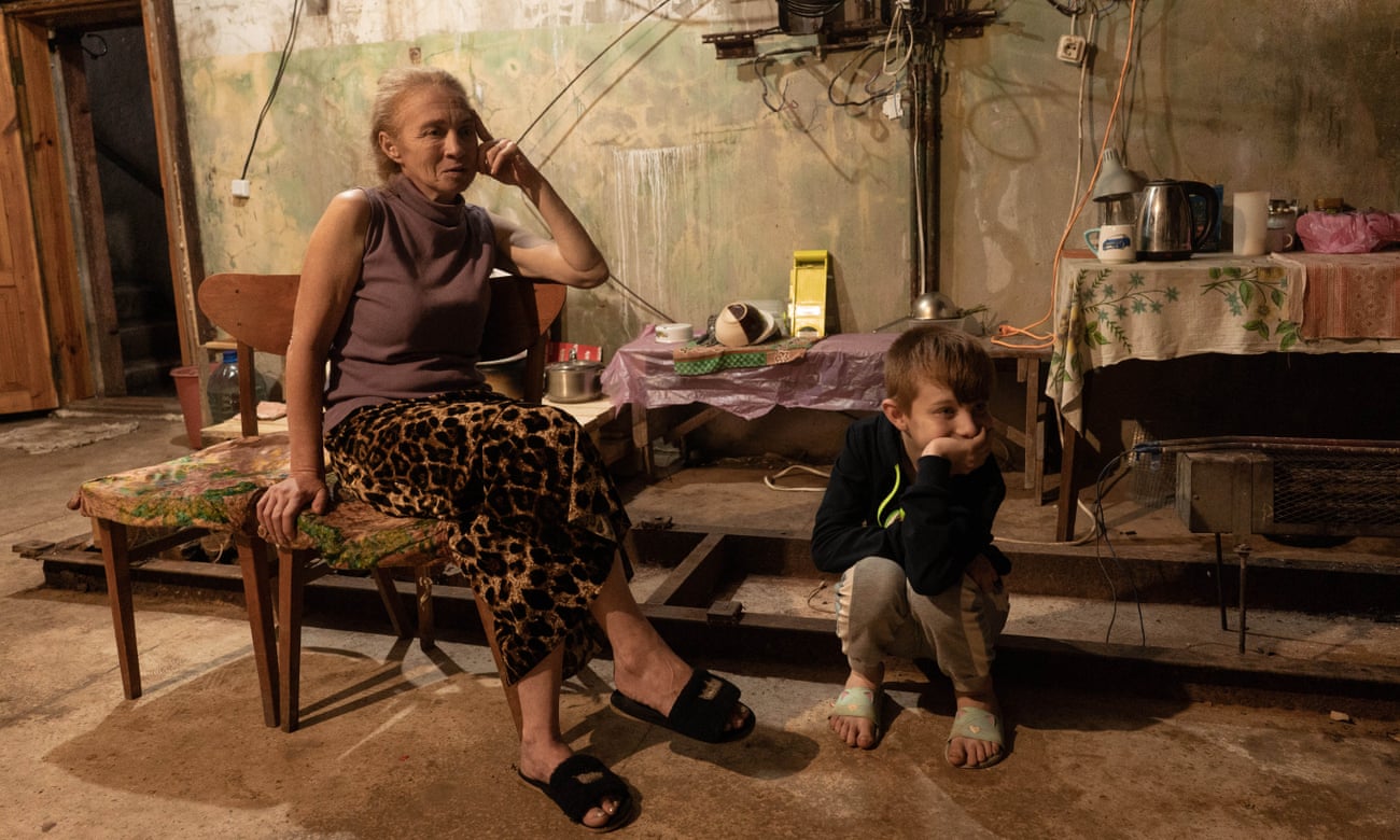 Svitlana and her son Danylo photographed while staying in the bomb shelter in Sloviansk, Donetsk area.