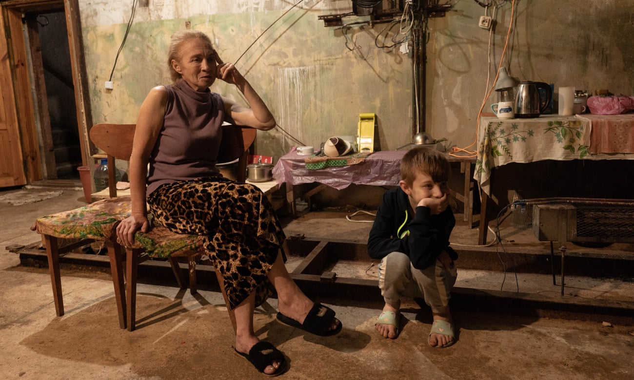 Svitlana and her son Danylo photographed while staying in the bomb shelter in Sloviansk, Donetsk area.