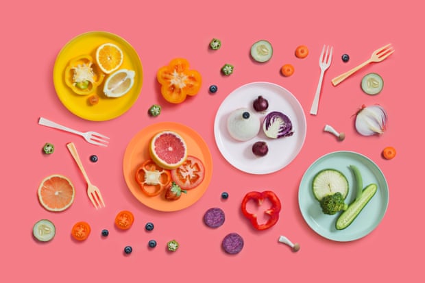 Colourful food including lemons, blood oranges, cucumbers and purple lettuce