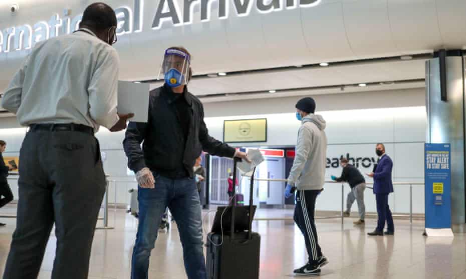 Passengers arriving at Heathrow Airport.