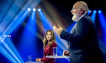 Dilan Yeşilgöz-Zegerius and Frans Timmermans take part in an election debate in Rotterdam, 20 November 2023. Timmermans is seen in profile speaking while Yeşilgöz-Zegerius looks on.