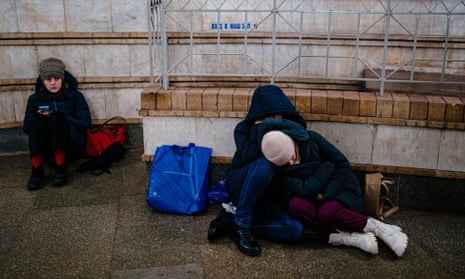 Civilians take shelter inside a metro station during an air raid alert in the centre of Kyiv early on Wednesday. 