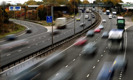 Traffic on a motorway. The chancellor promised to return taxes on new cars to ‘the use for which it was originally intended’ by creating a new road fund.