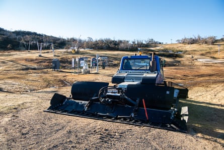 A snow plough lays idle due to a lack of natural snow at Smiggin Holes, part of Perisher Blue Ski Resort, NSW.