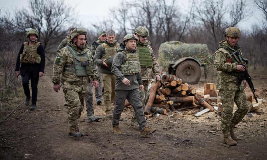 Ukraine’s President Volodymyr Zelenskiy visits positions of armed forces in the Donbass region on Thursday.