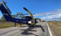 A rescue helicopter at the scene of a fatal bus crash on the Bruce Highway near Gumlu in north Queensland