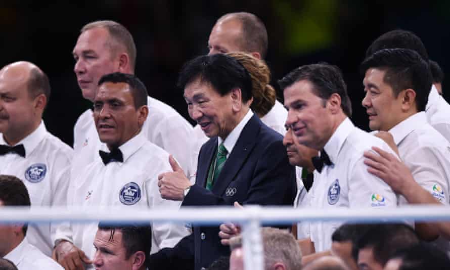Wu Ching-kuo, the Aiba president, with referees and judges after the final boxing session at the 2016 Rio Olympic Games