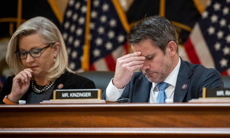 Adam Kinzinger sits with Liz Cheney, the other Republican on the 6 January commitee, during a hearing this month.