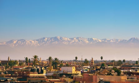 The Atlas mountains shimmer above Marrackech.