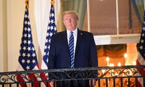 Donald Trump poses on the Truman Balcony of the White House after being released from hospital following coronavirus treatment on October 5 2020.