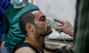 An affected man receives treatment after a suspected chemical attack in eastern Ghouta, Syria.