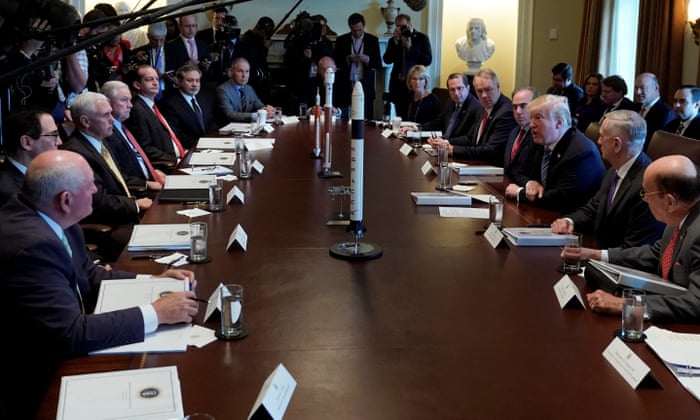 U.S. President Donald Trump holds a cabinet meeting in Washington, with some model rockets.