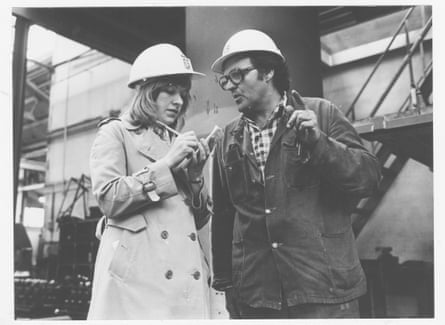 Polly Toynbee reporting on industry for the Observer, talking to a man wearing a hard hat