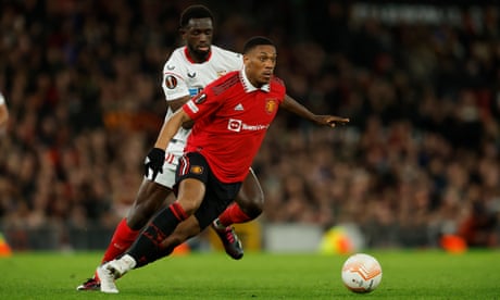 Anthony Martial, shown evading a Sevilla defender, had a hand in both of Manchester United’s goals.