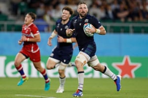 Scotland’s flanker John Barclay runs in to score a try.
