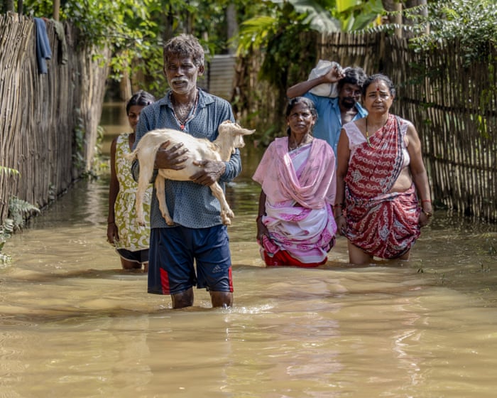 ‘We feared we’d all be drowned’: the Indian floods that killed more than 100 and left thousands homeless