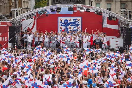 The victorious England team take to the stage at Trafalgar Square