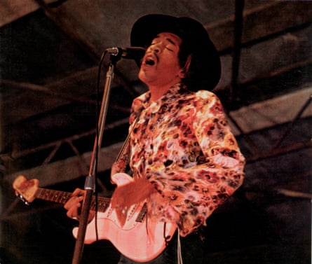 A man playing a guitar