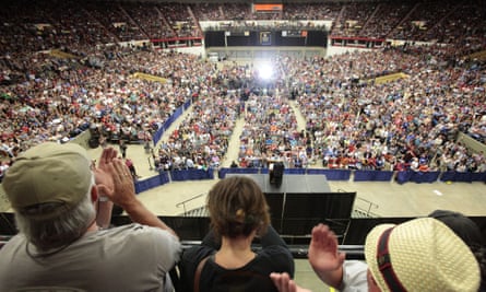 People cheer as Bernie Sanders speaks in the Veterans Memorial Coliseum.