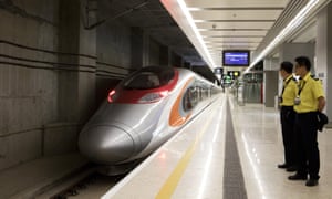 A Vibrant Express train at West Kowloon station.