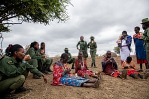 Talking with the local community to gather information and intelligence