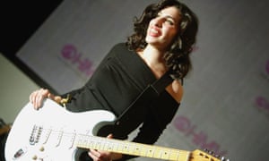 Amy Winehouse poses for photographs at HMV Oxford Street on 15 January 2004.