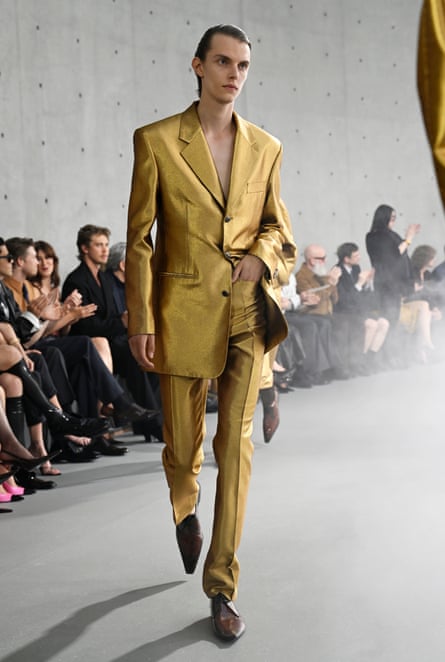 A model in a skinny suit at the Saint Laurent show.