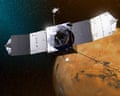 a silver spacecraft in front of a red planet