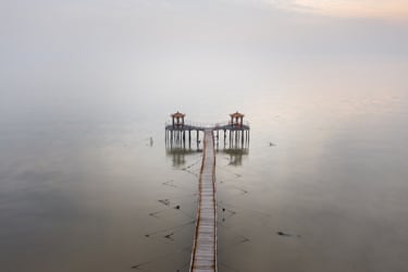 A deserted pavilion extends out into Bohai Bay near Ninghe, eastern Tianjin