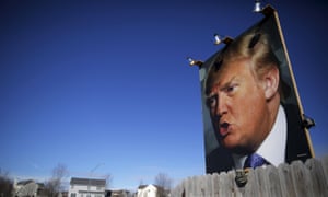 A large poster of Donald Trump in West Des Moines, Iowa