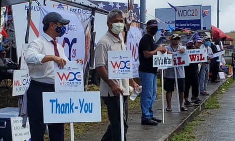 Wil Castro (left, in mask) campaigning as the Republican candidate for Guam’s representative seat. Despite being US citizens, residents of Guam are not able to vote for president. In place of actual voting, the island does a presidential ‘straw-poll’, which is an accurate barometer of the national vote.