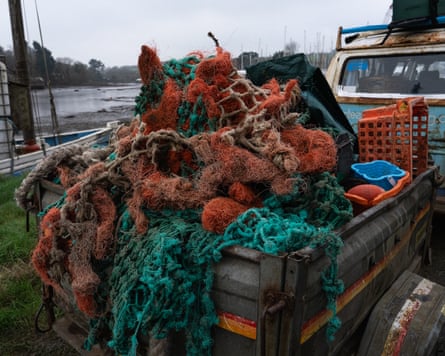 Rescued boats, plastic, and marine debris pile up on Steve’s dockside.