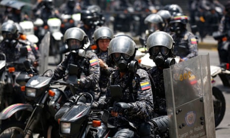 Police on motorcycles patrol in Caracas, Venezuela