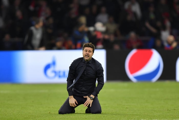 An emotional Pochettino, not ready for the microphone just yet.