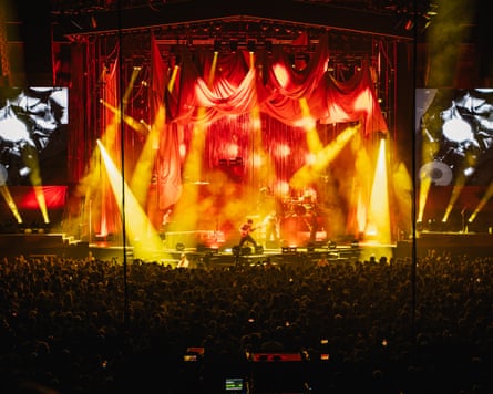 A wide shot of Biffy Clyro on stage.