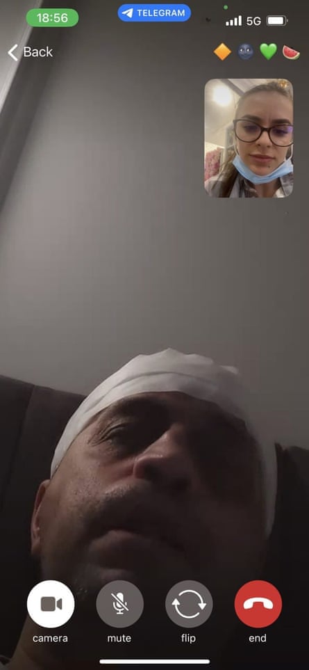 A screengrab from Telegram of Dzhambazov, wearing what appears to be loo roll on his head, while on a video call with Vanya Gaberova.