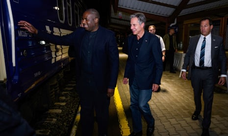 United States Secretary of State Antony Blinken (C) and Britain’s Foreign Secretary David Lammy (L) board a train at Przemysl train station, in Poland as they prepare to travel to Ukraine on September 11, 2024.