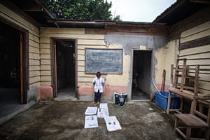 A first-year student in the schoolyard at La Fe in Equatorial Guinea