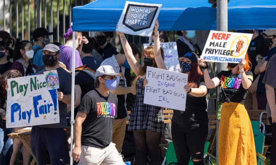 US-IT-GAMES-SEXISM-ACTIVISIONEmployees of the video game company, Activision Blizzard, hold a walkout and protest rally to denounce the companys response to a California Department of Fair Employment and Housing lawsuit and to call for changes in conditions for women and other marginalized groups, in Los Angeles on July 28, 2021. (Photo by DAVID MCNEW / AFP) (Photo by DAVID MCNEW/AFP via Getty Images)